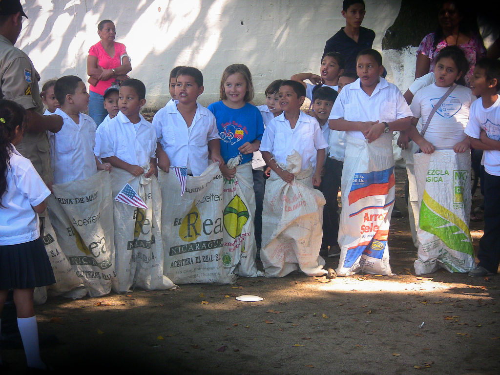 The Parker kids join in the fun and games with local Honduran students