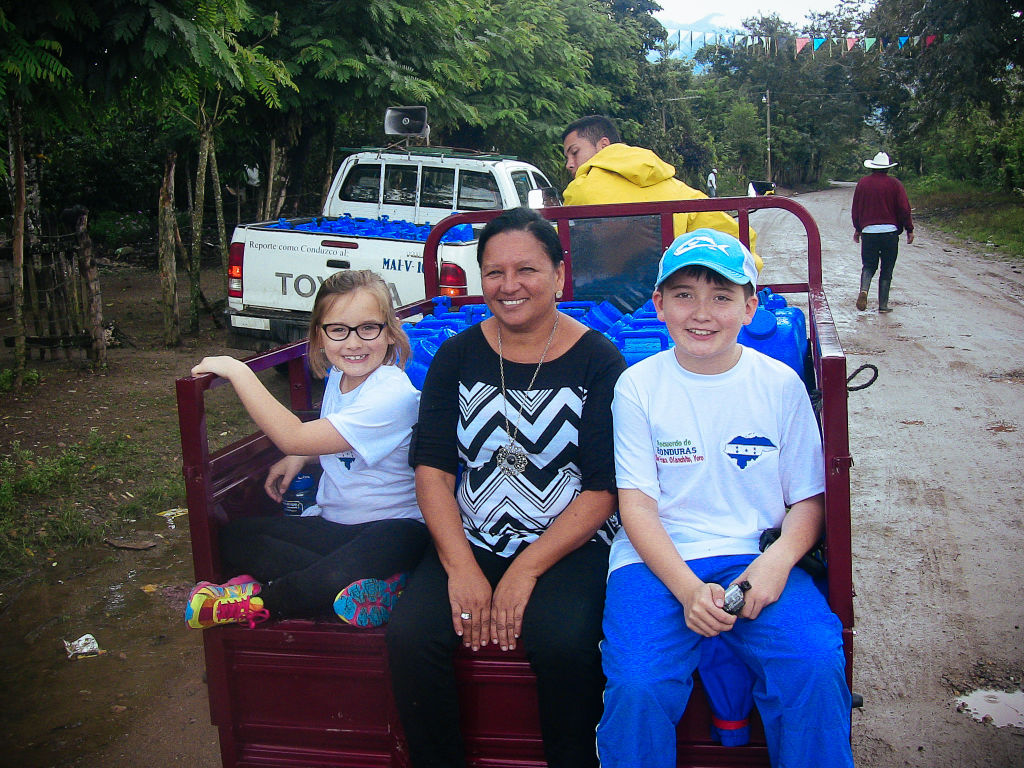 Scotty Parker and sister deliver safe water in Honduras.