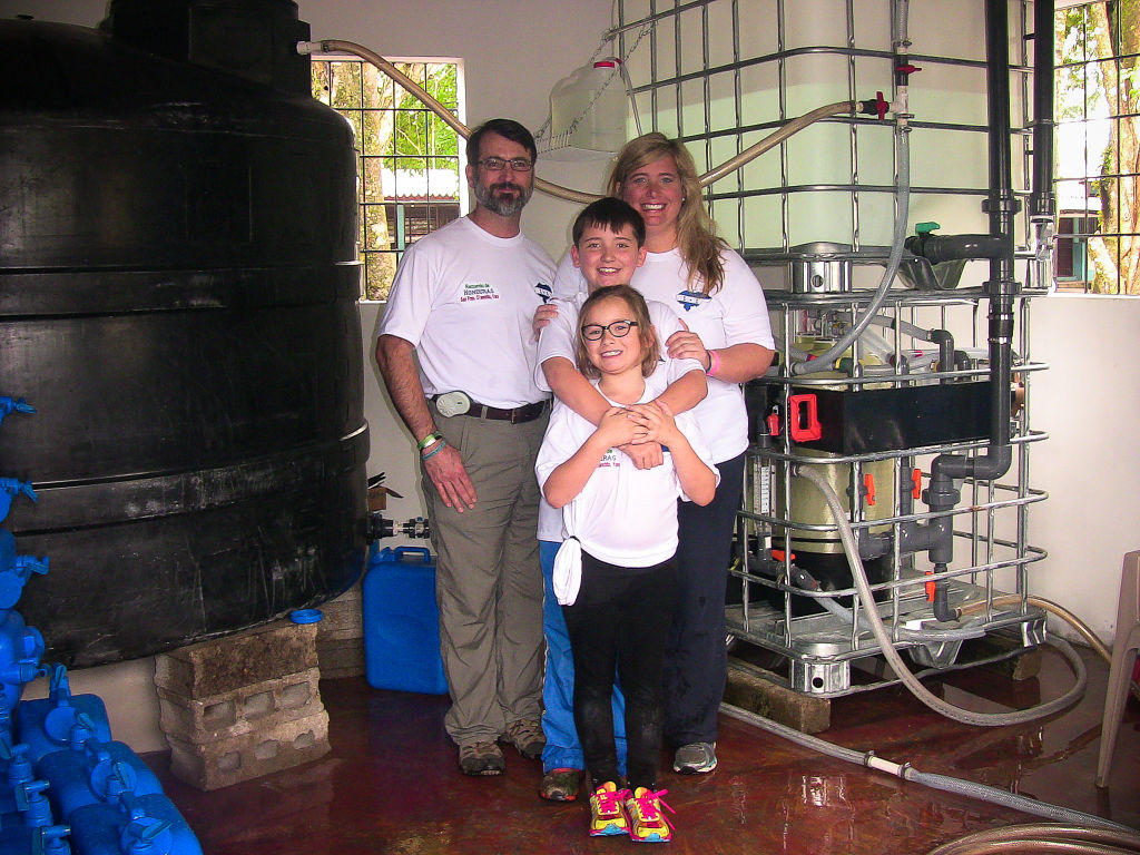 Scotty Parker and his family visit safe water projects in Honduras.