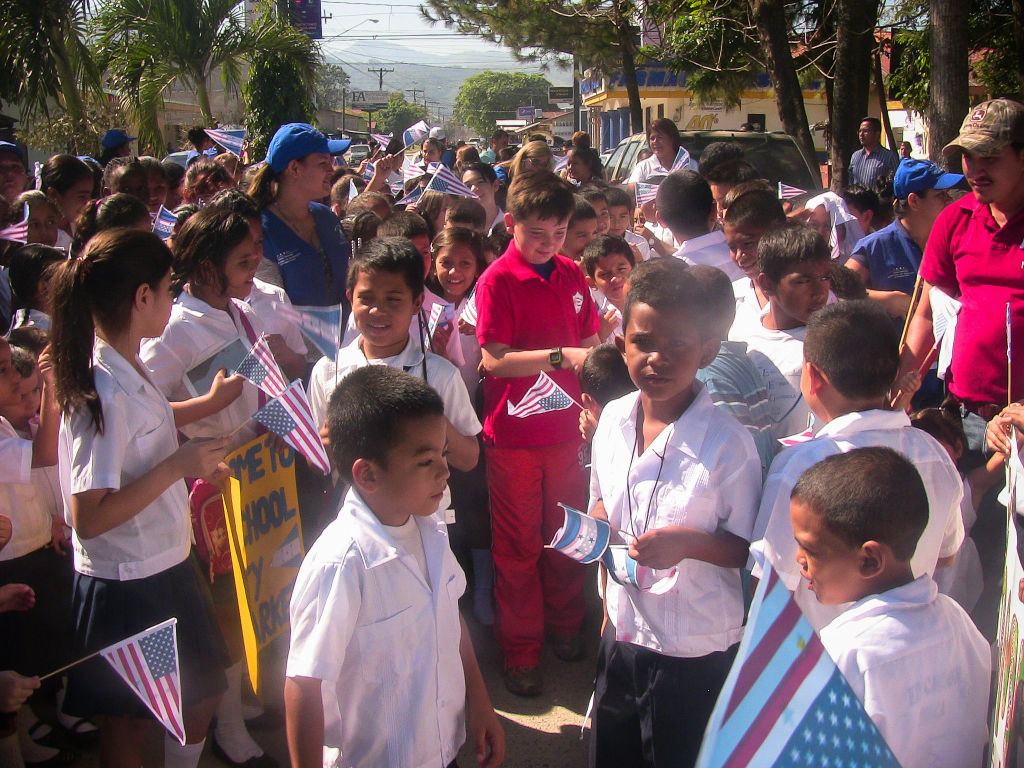 Scotty Parker greets children in Honduras.