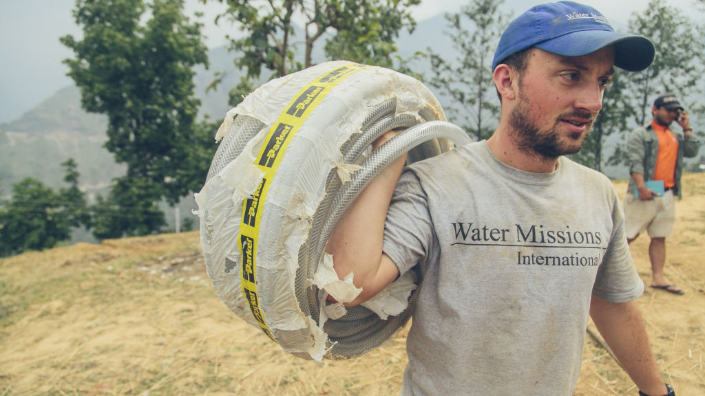 Tim carries Parker hose | Nepal Earthquake