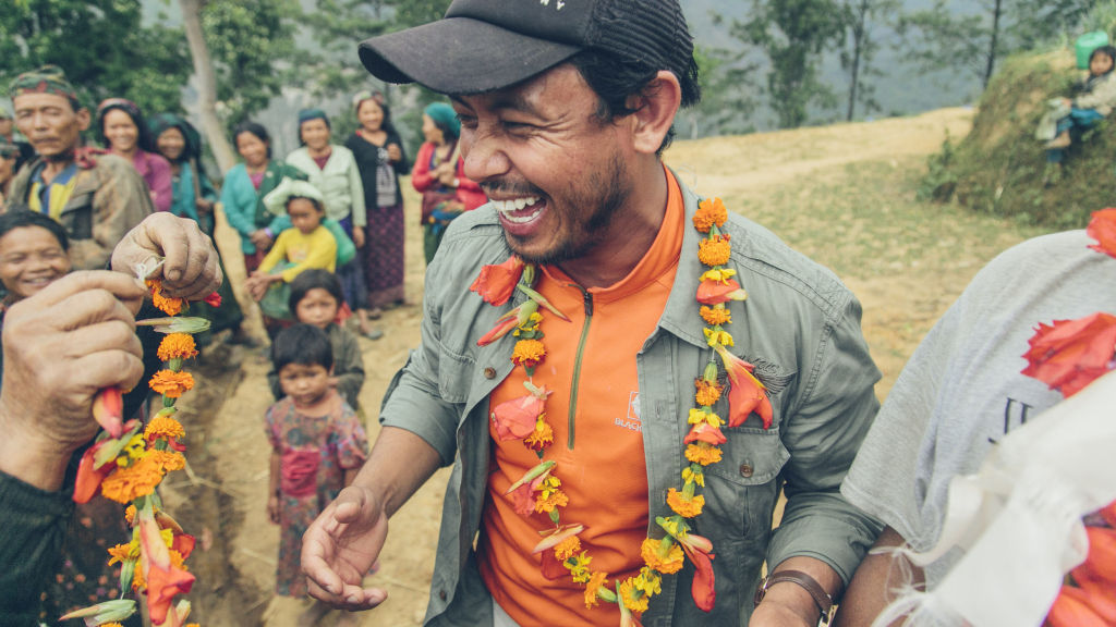 Receiving flower necklaces | Nepal Earthquake