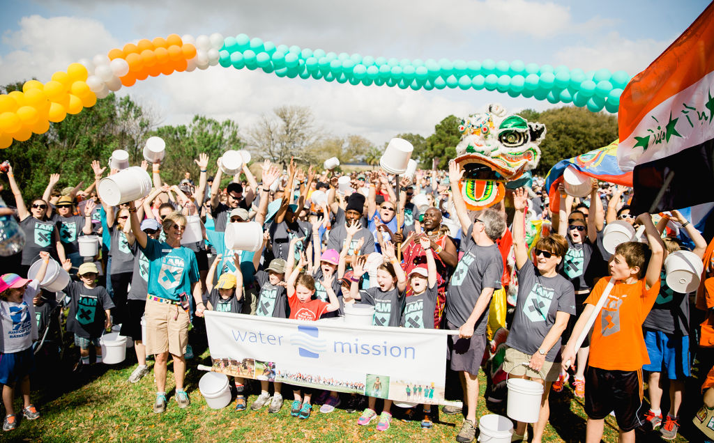 Walker do the wave at the Charleston Walk for Water