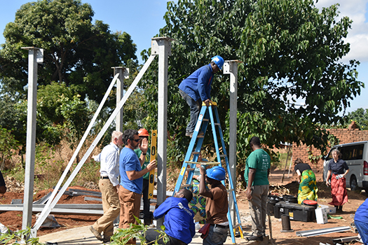 The team assembles the safe water tower.