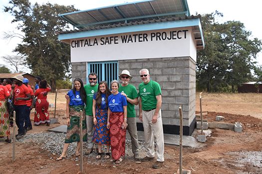 The Project Elevate team celebrates safe water in Malawi.