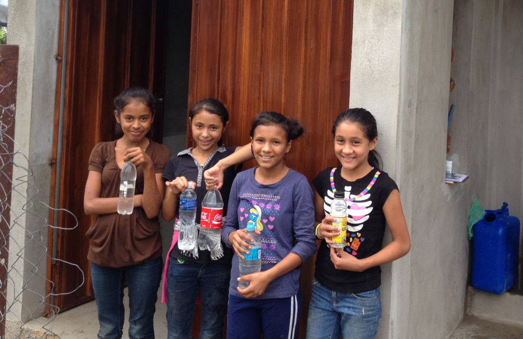Girls in Pisijire, Olancho, Honduras collect safe water