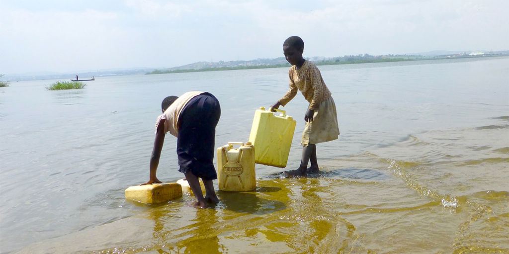 Water is drawn from Lake Victoria near Kisima Island | Ryan Belk Photography