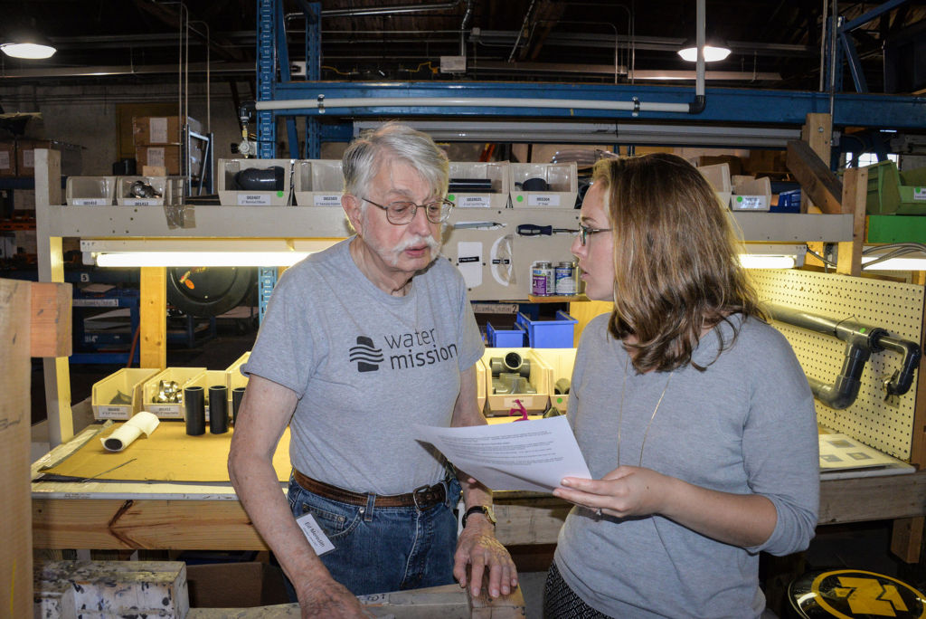 Volunteer Veteran Ed Meredith with Volunteer Coordinator Elizabeth Hiott at Water Mission's headquarters in North Charleston, South Carolina.