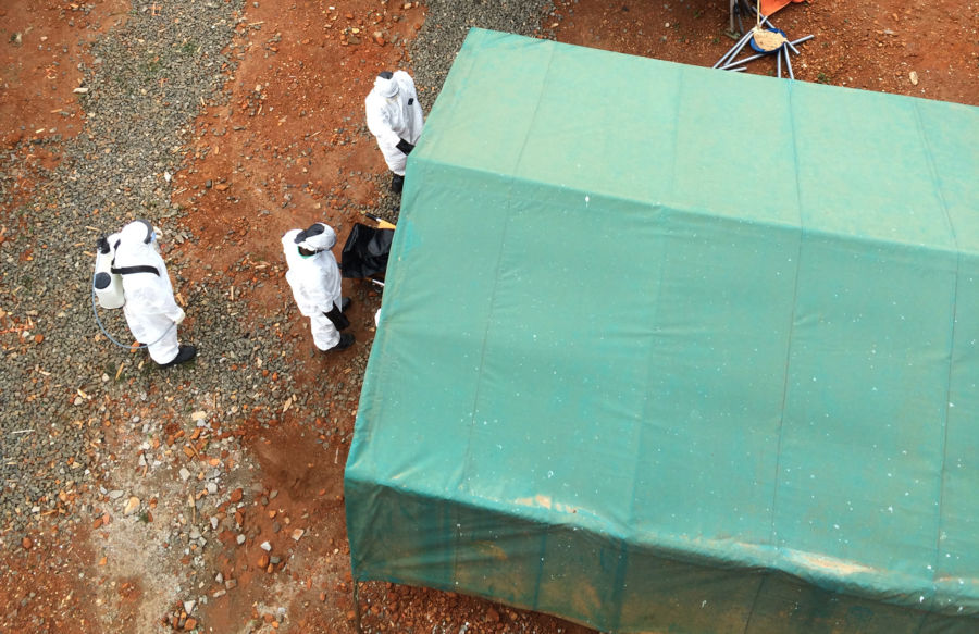 Healthcare workers at JJ Dossen Hospital in Harper, Liberia, at work.