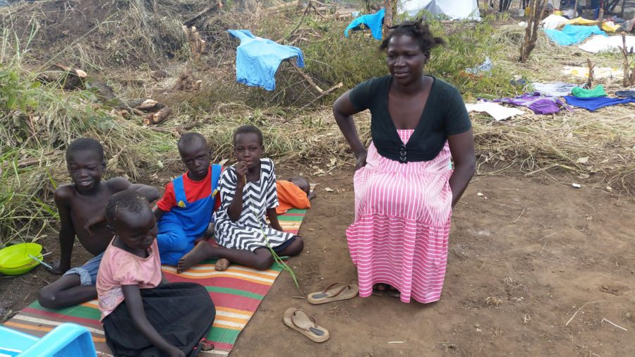 A South Sudanese mother with her children in a Ugandan refugee camp.