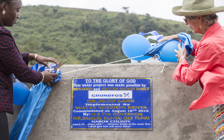Water Mission Founder Molly Greene helps celebrate the new safe water project in Enariboo, Kenya.