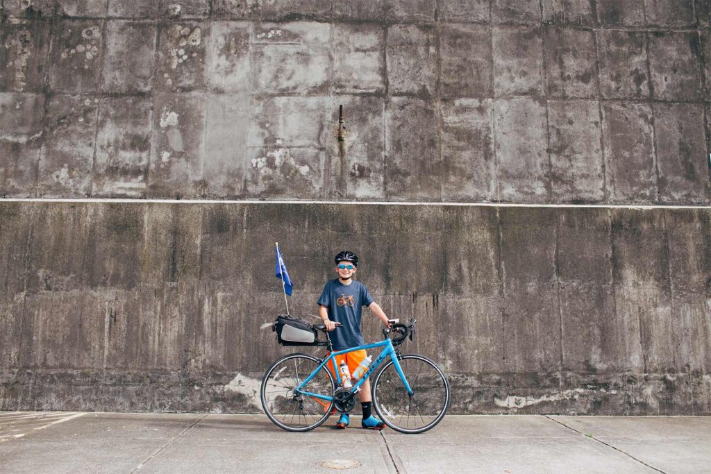 Scotty Parker rides his bike to raise money for safe water with Water Mission.