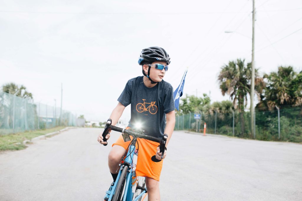 Scotty Parker rides his bike to raise money for safe water with Water Mission.