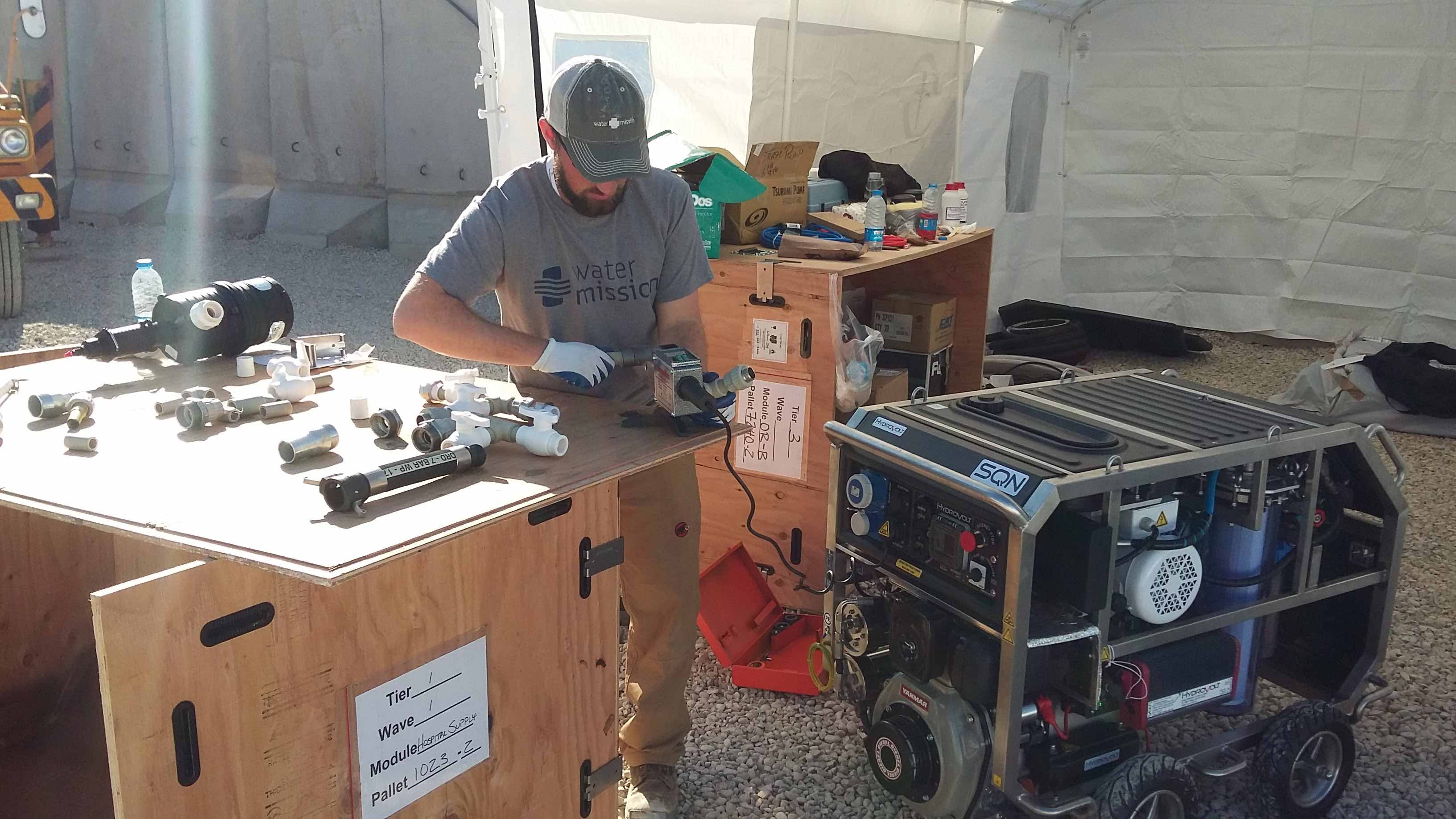 Tim works to implement a safe water solution Iraq.