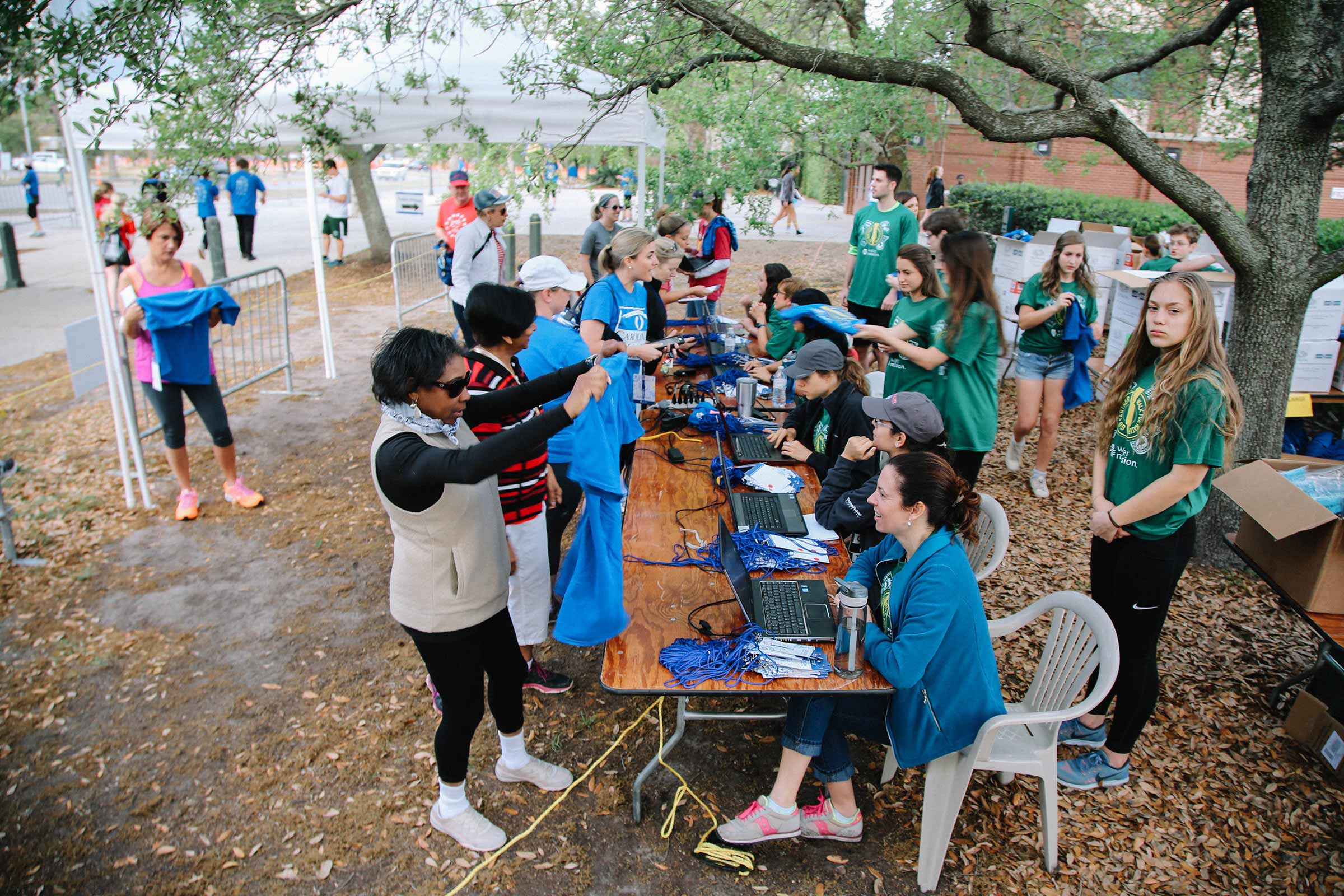 Water Mission volunteers work the registration table at the Walk for Water.