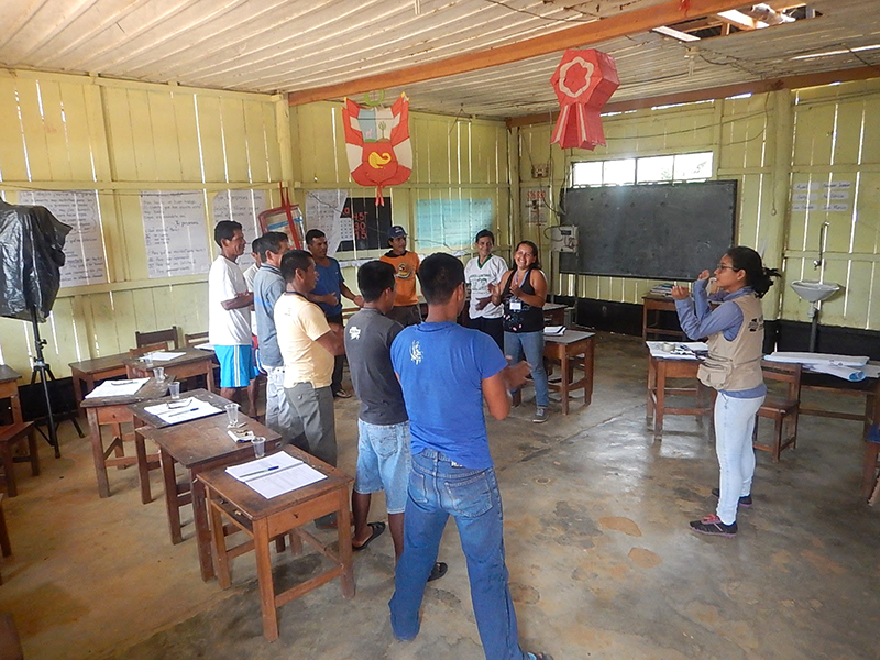 Water Mission Peru staff conduct a WASH training course with the safe water committee.