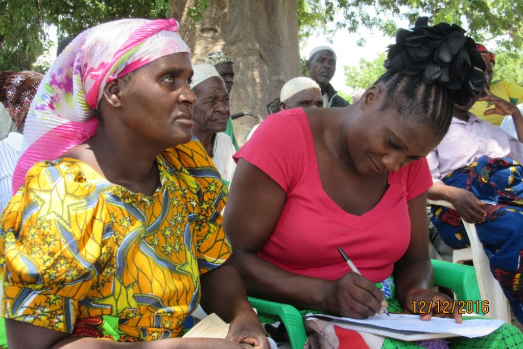 Community members learn about proper WASH practices.