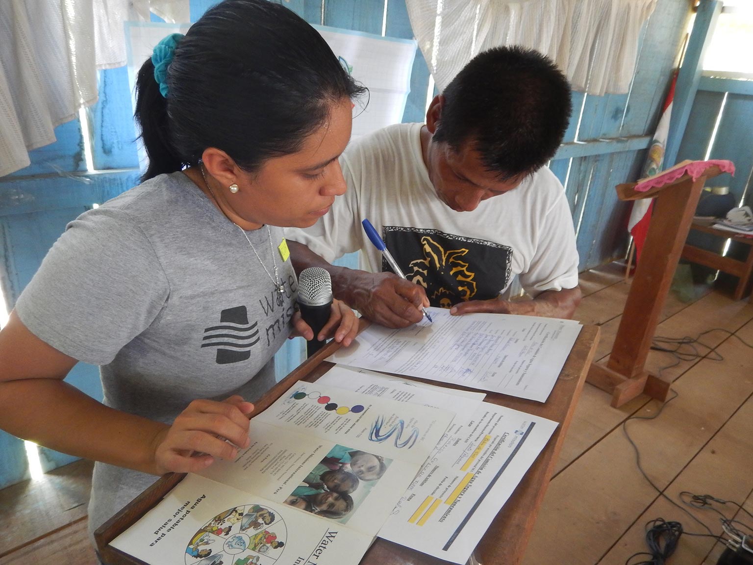 Water Mission Peru staff train community safe water committee members on proper hygiene practices.