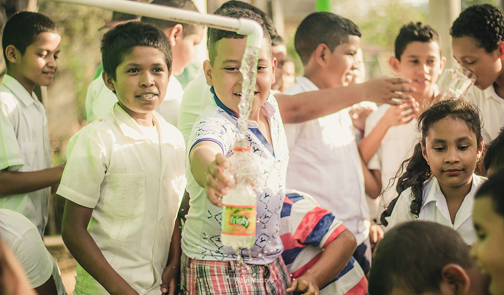 A young boy enjoys safe water!