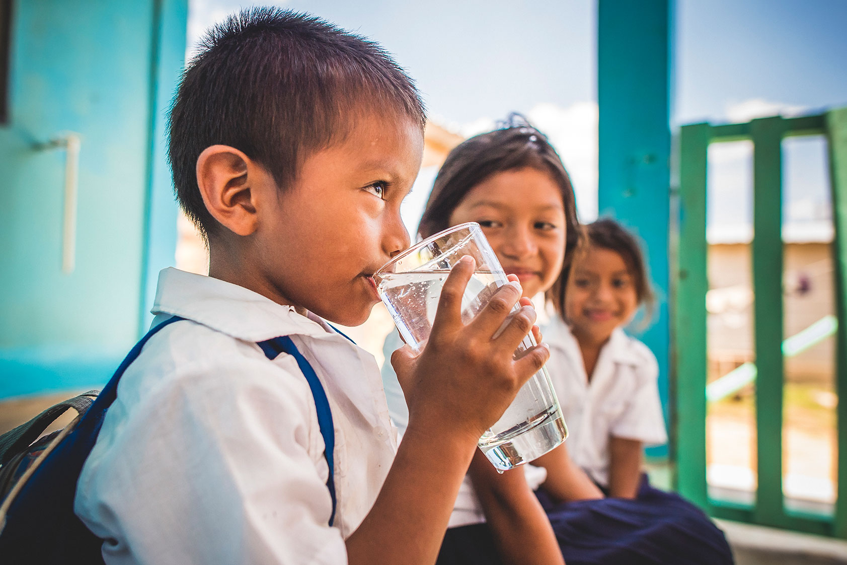 A young boy enjoys safe water in Honduras thanks to Pentair and Water Mission.