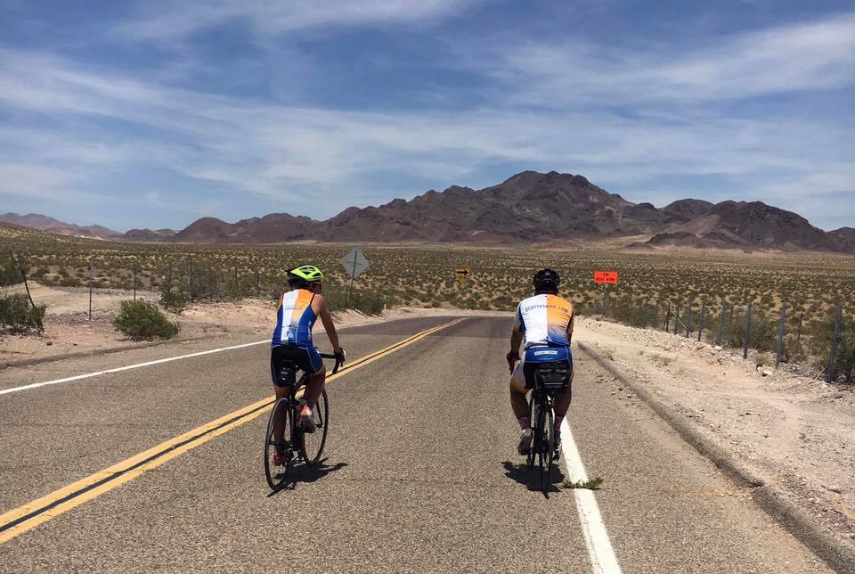 The Scotty's Ride team biking through the mountains.