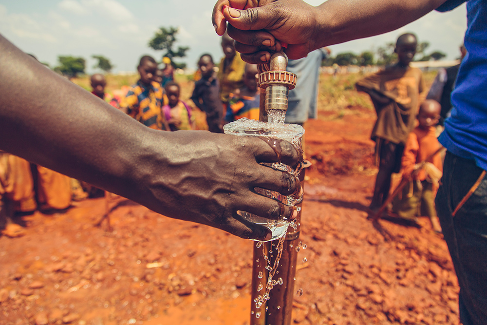 Safe water flows from the world's largest solar-powered treatment system located in Nyarugusu, Tanzania.