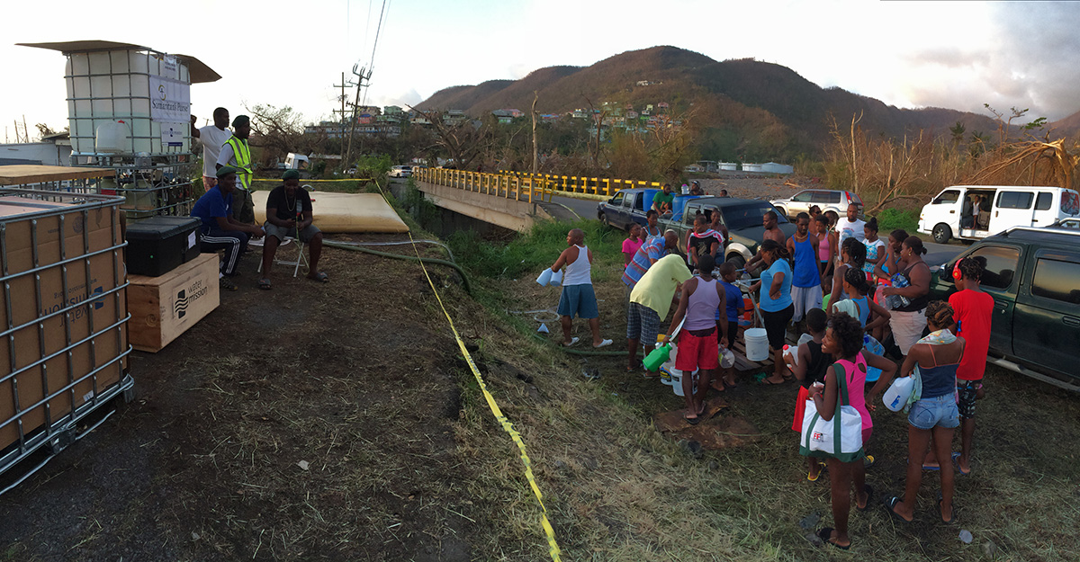 Water Mission's safe water treatment system is set up and serving safe water.