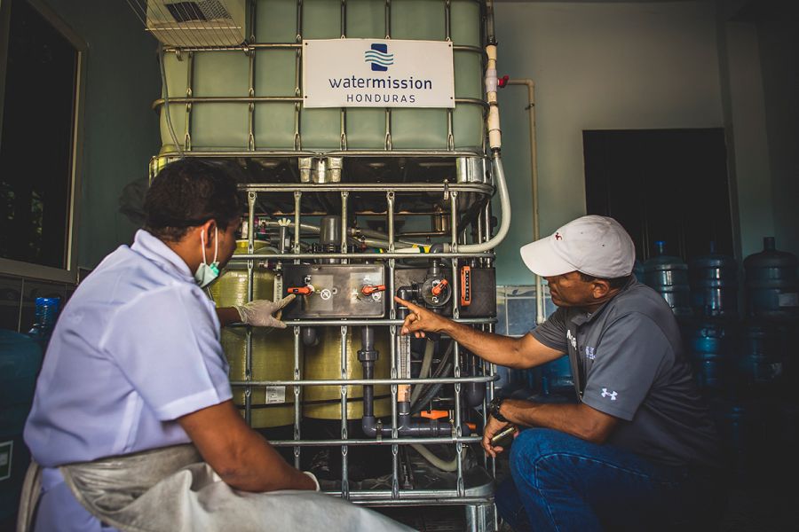 Engineers work on a safe water system in Honduras.