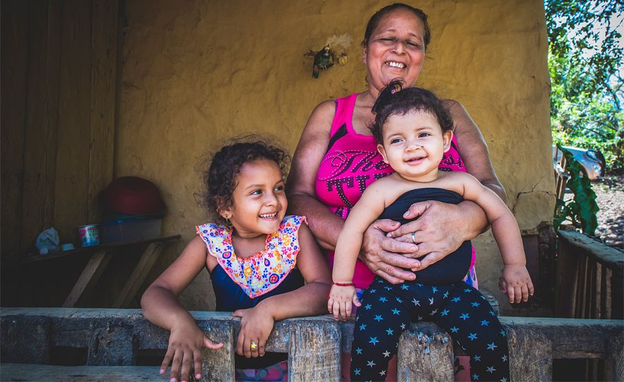 Felis and her two young granddaughters, Briyi and Yamaly.