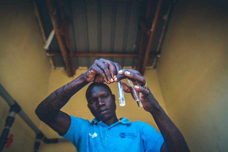 Testing the quality of water in Uganda.