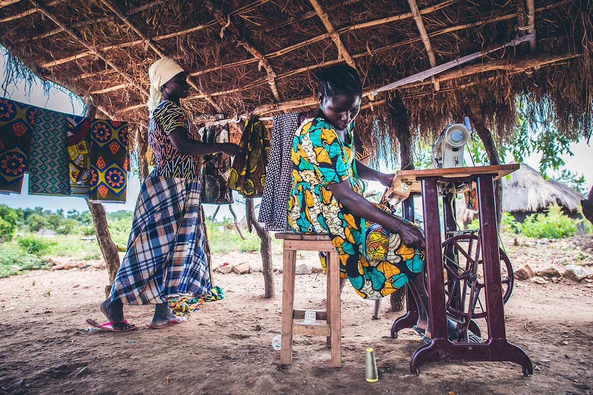 Dada Angelo's wife mending clothes