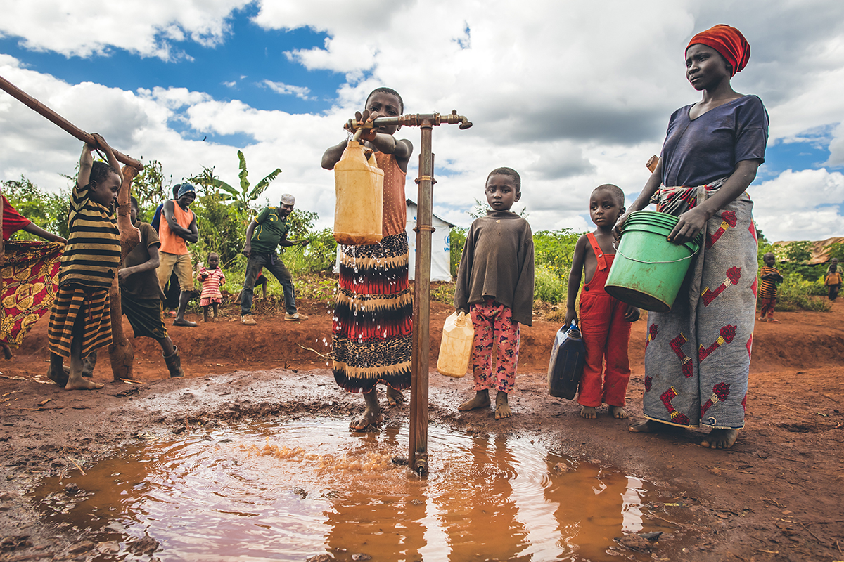 Children draw safe water in Nyarugusu