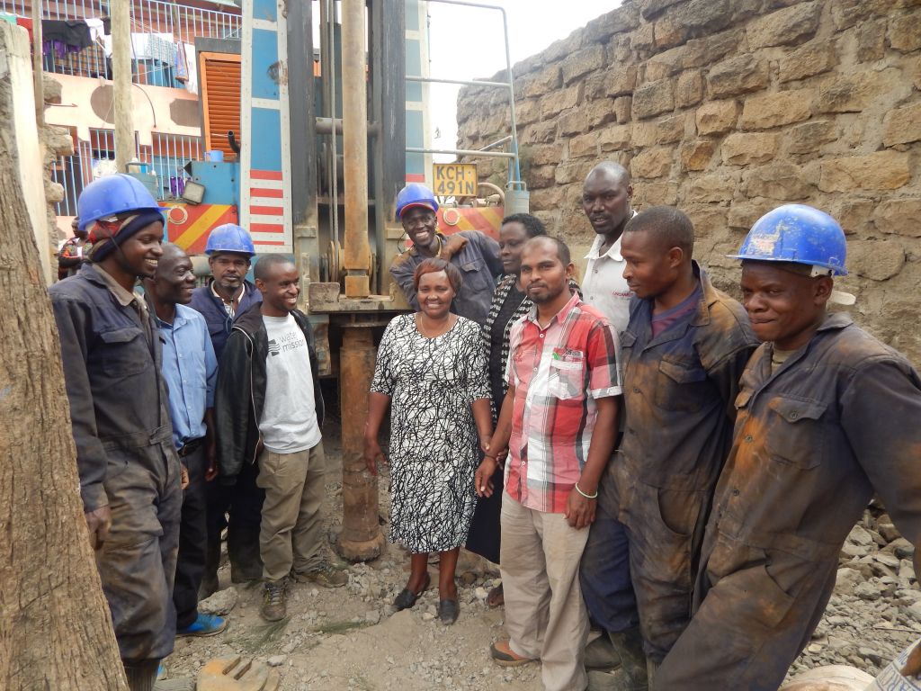 Water Mission Kenya staff with community members