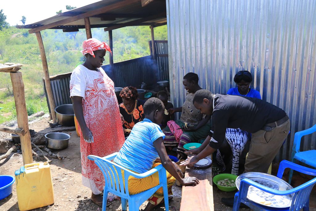 Women learn to make chapati and mandazi.