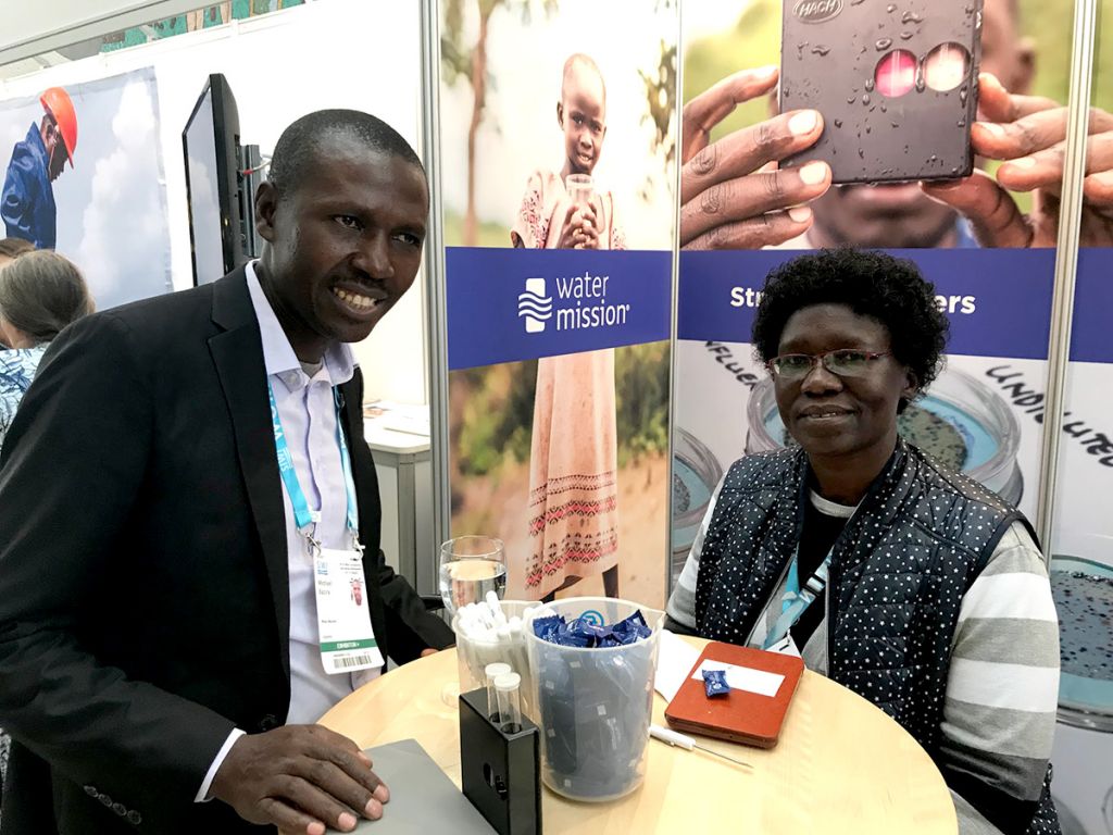 Michael Bazira at Water Mission's booth.