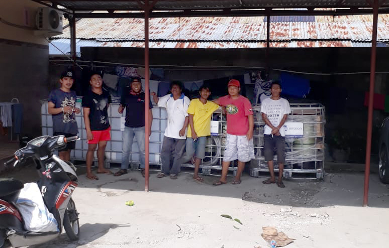 Our Indonesia team with water systems ready to be deployed.