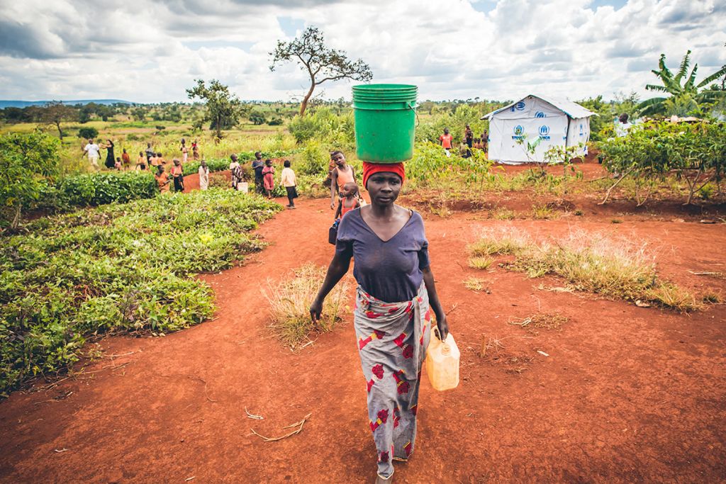 Walking for water in Nyarugusu Refugee Settlement