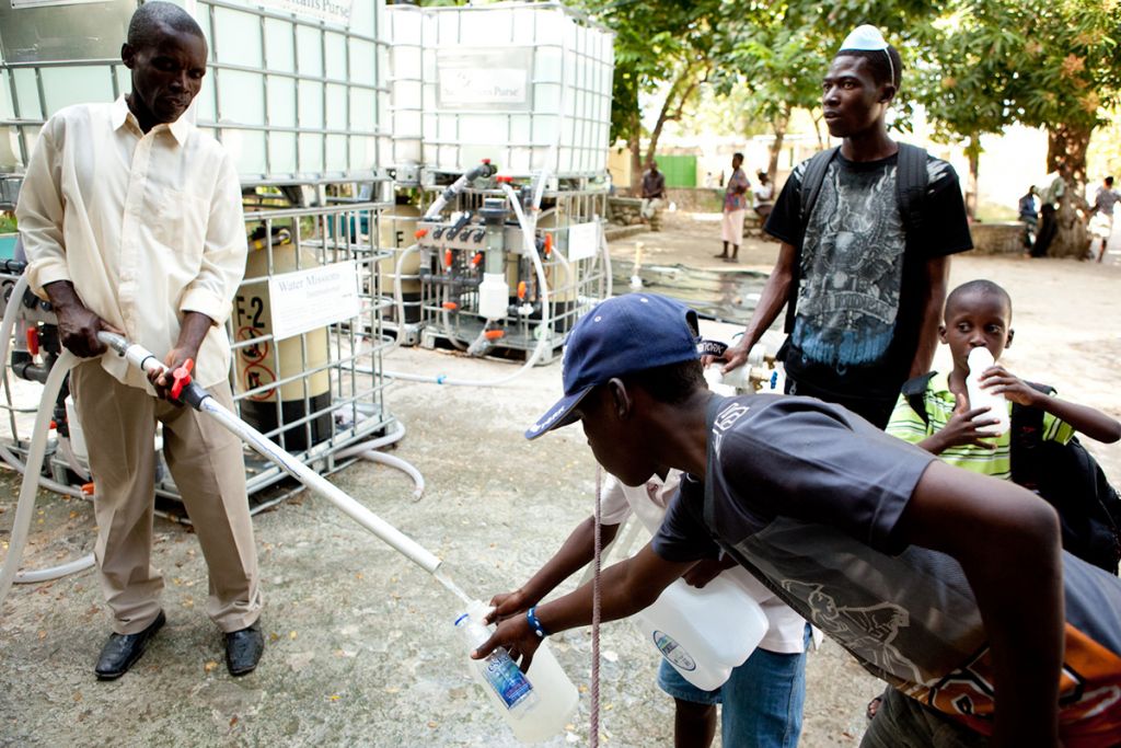 Drawing water from Water Mission treatment systems