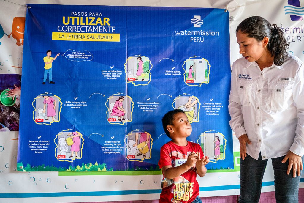 Vicky teaches healthy water, sanitation, and hygiene behaviors