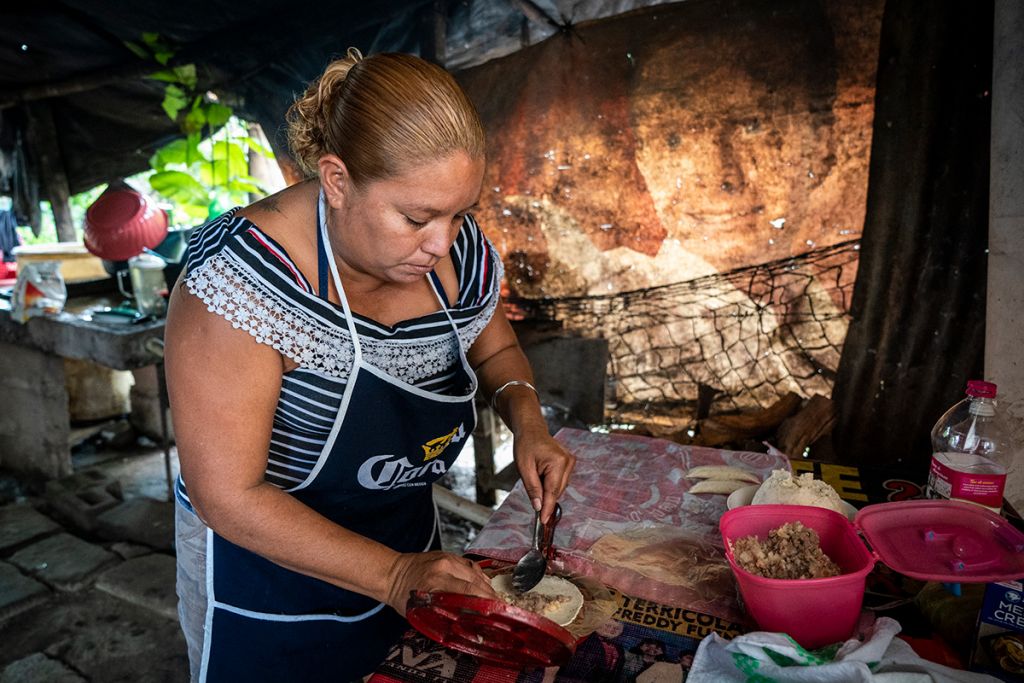 Reina preparing the restaurant's food